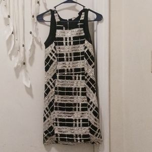 Just me brand. small mini dress. black, silver, and being color.